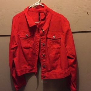 Red denim cropped jacket.